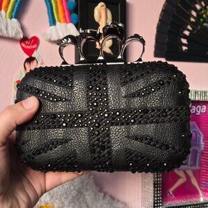 black jewelled union jack clutch with skull ring handle